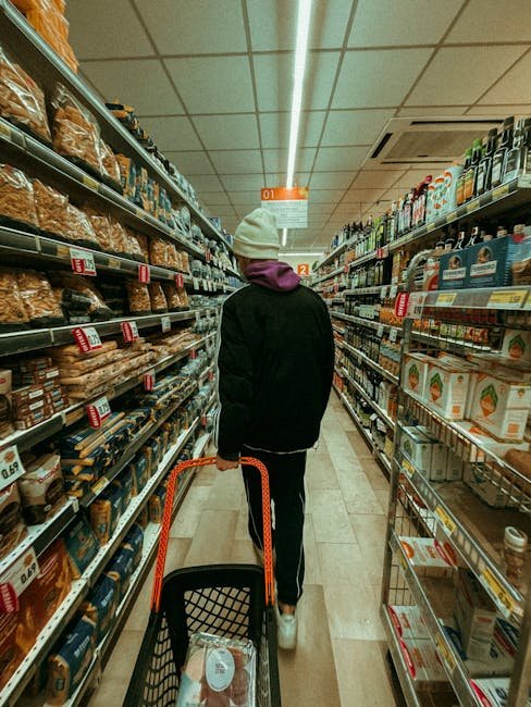 Shopper browsing grocery aisles